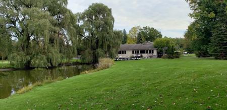 pond, tress and back of great hall