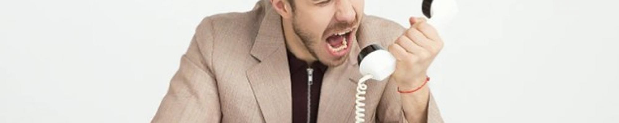 man yelling at phone